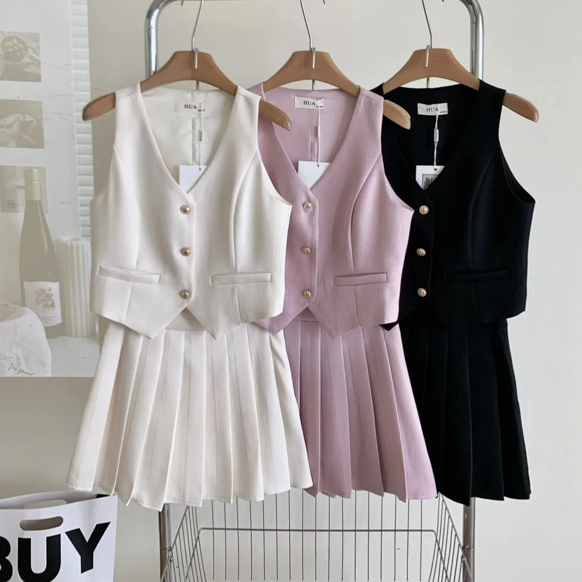 

Женские комплекты юбок, новинка 2023 года, летний жилет без рукавов, куртка с высокой талией, плиссированная юбка, костюмы из 2 предметов, женская элегантная юбка-миди, наряд