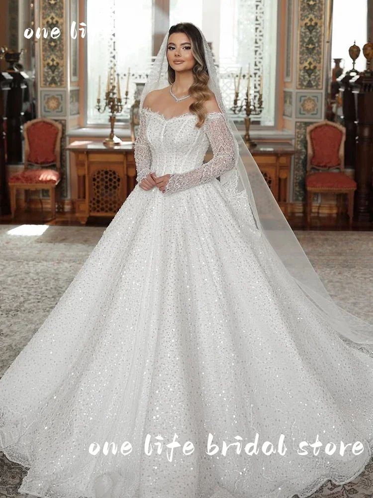 Abito da sposa lussuoso Abito da ballo completamente in rilievo Scollo a barca Manica intera Abito da sposa personalizzato Bottone posteriore Vestido De Novia Paillettes