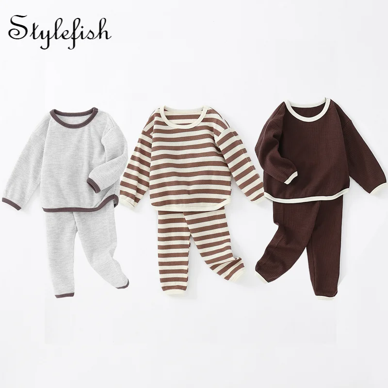 Autumn 2022 new baby comfortable and soft baby waffle suit Round Neck Long Sleeve Top + pants two piece set high quality