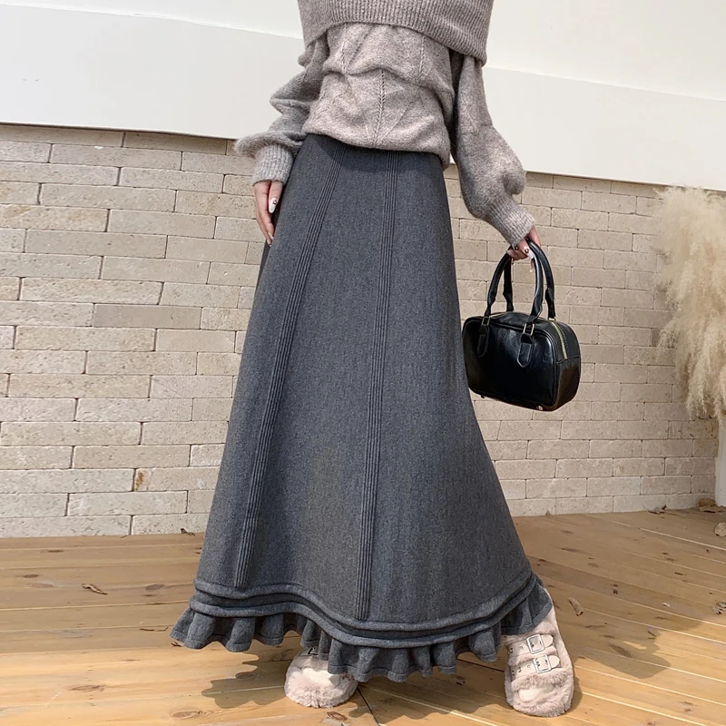 2025 한국 버전 가을 겨울 신축성 있는 허리 플리츠 스커트 하프 스커트 슬림 스커트 페어리 솔리드 심플 오피스 니트 A라인