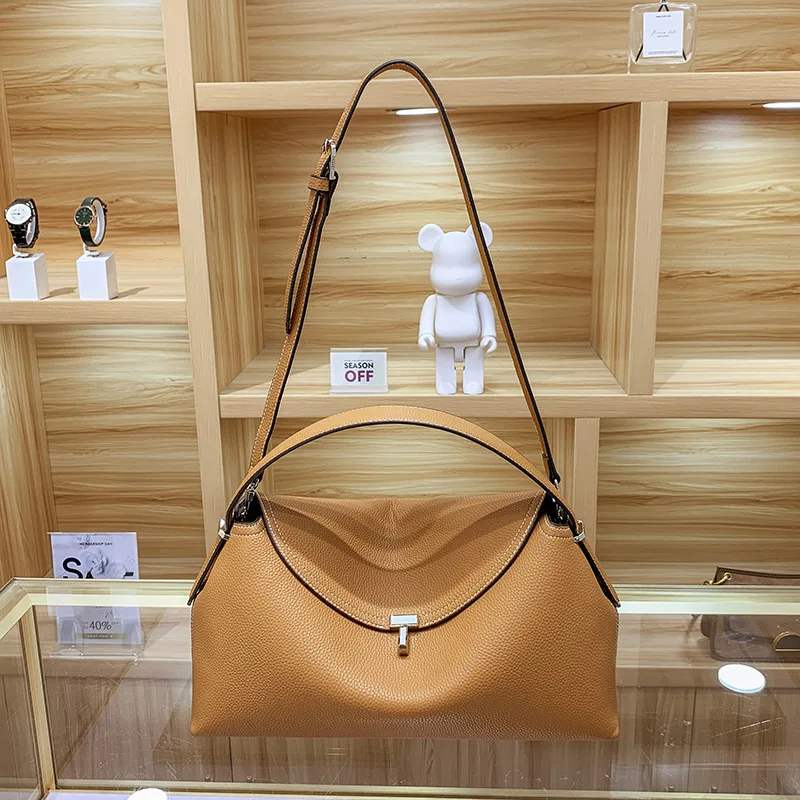 Luxury design brand women\'s cowhide metal lock pebble handbag new versatile fashion light luxury niche shoulder bag for women