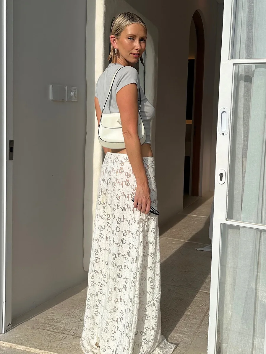 

Новая летняя коллекция 2026: Модные уличные белые жаккардовые юбки с прозрачными вставками и низкой талией, универсальные кружевные юбки для женщин