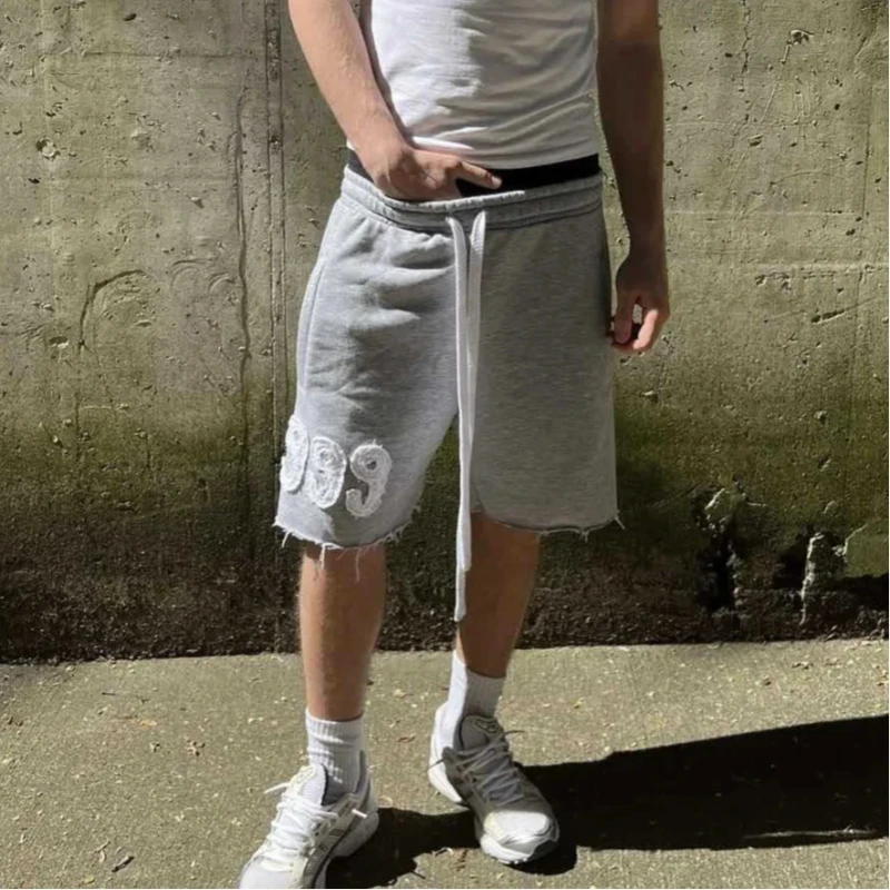 Trendy High Street Trend Loose Casual Personality999 Pattern Embroidery Elastic Waist Lace Up Sports five quarter Pants Men Wom