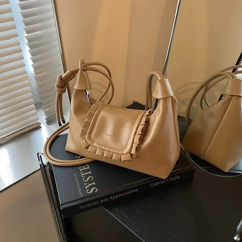 

Simple solid color soft leather armpit bag for women 2025 new autumn and winter versatile commuting shoulder crossbody bag