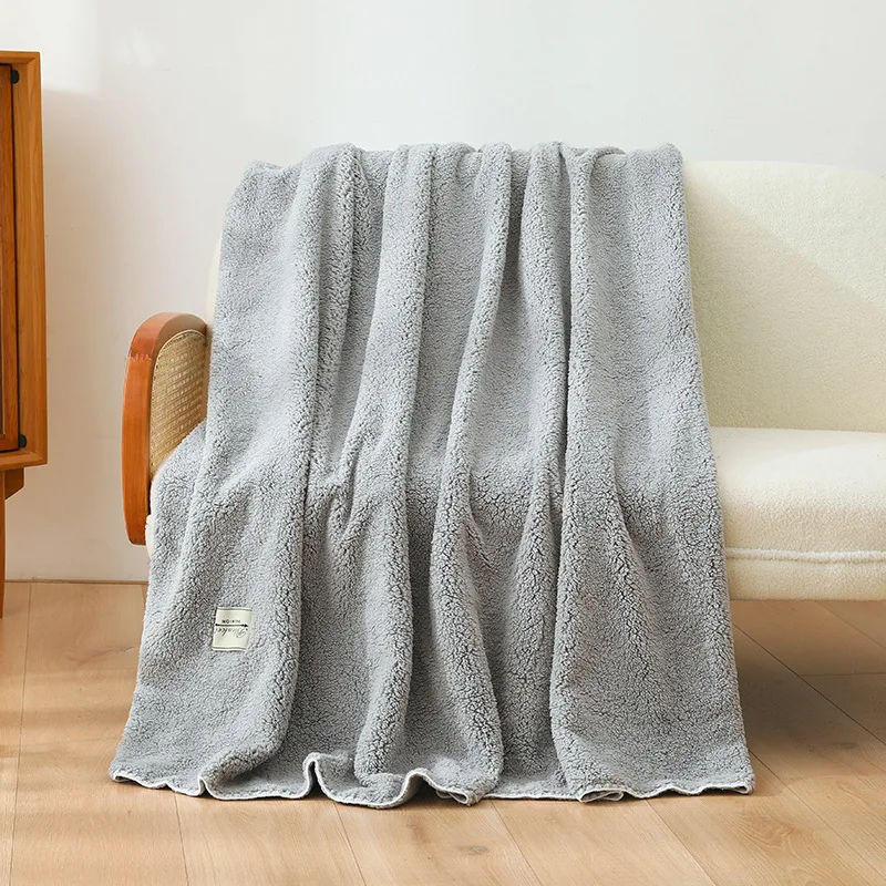 

New lamb wool double-sided composite blanket spot wholesale edge locking four-season universal thermal sofa blanket