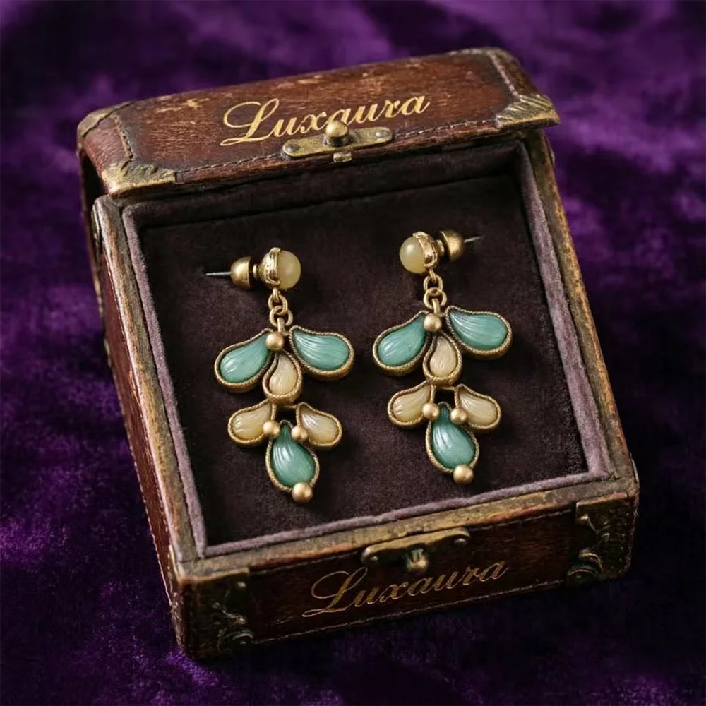 

Vintage jewelry fashion classic geometric enamel leaf earrings design paired with bohemian style female earrings