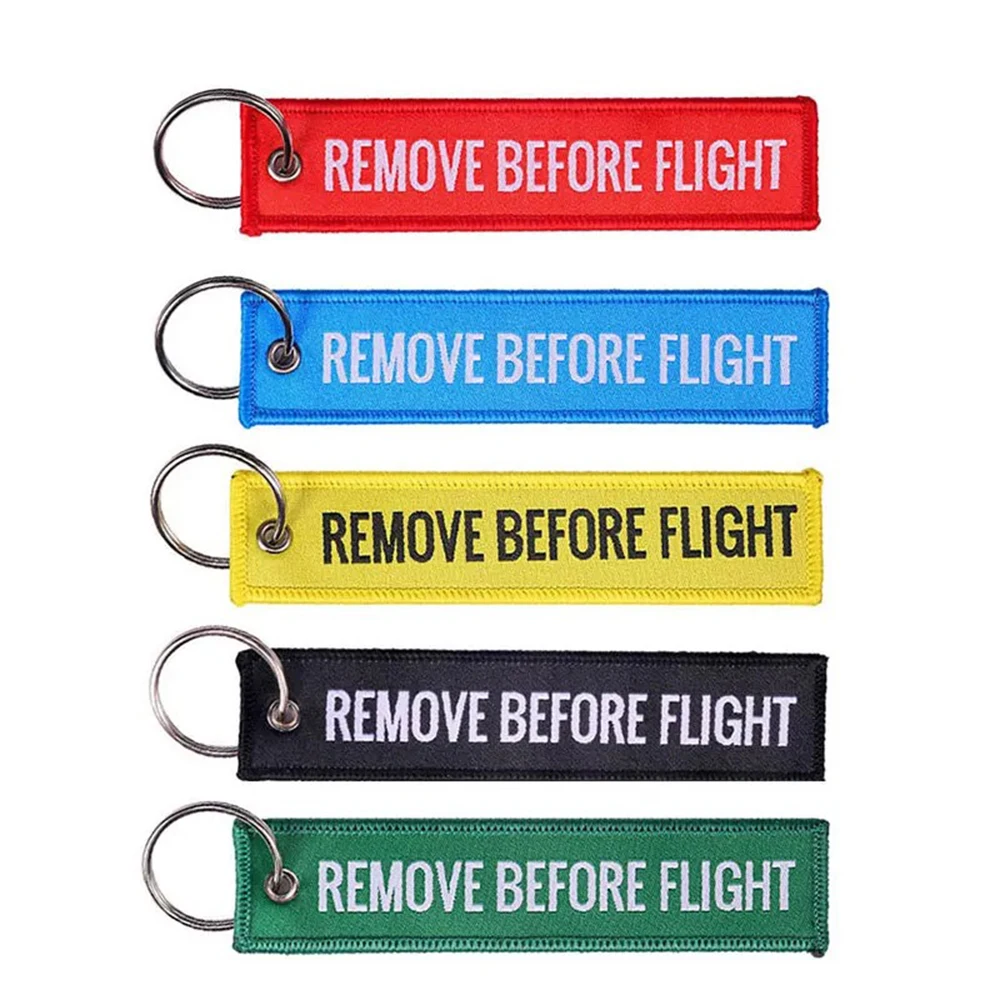 Wholesale 100Pcs Embroidery REMOVE BEFORE FLIGHT Keychain Name Dog Tag Motorcycle Key Chain Accessories Souvenir Personalized