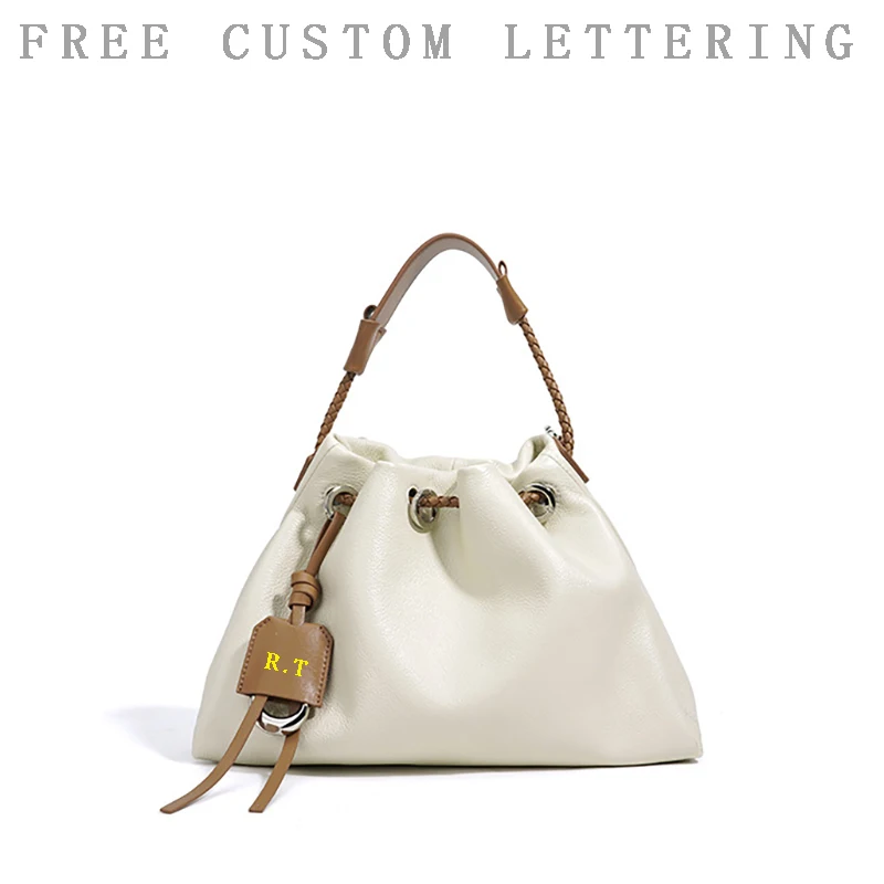 

Genuine leather lucky bag 2025 new niche design top layer cowhide drawstring one-shoulder crossbody bag fashion ladies handbag