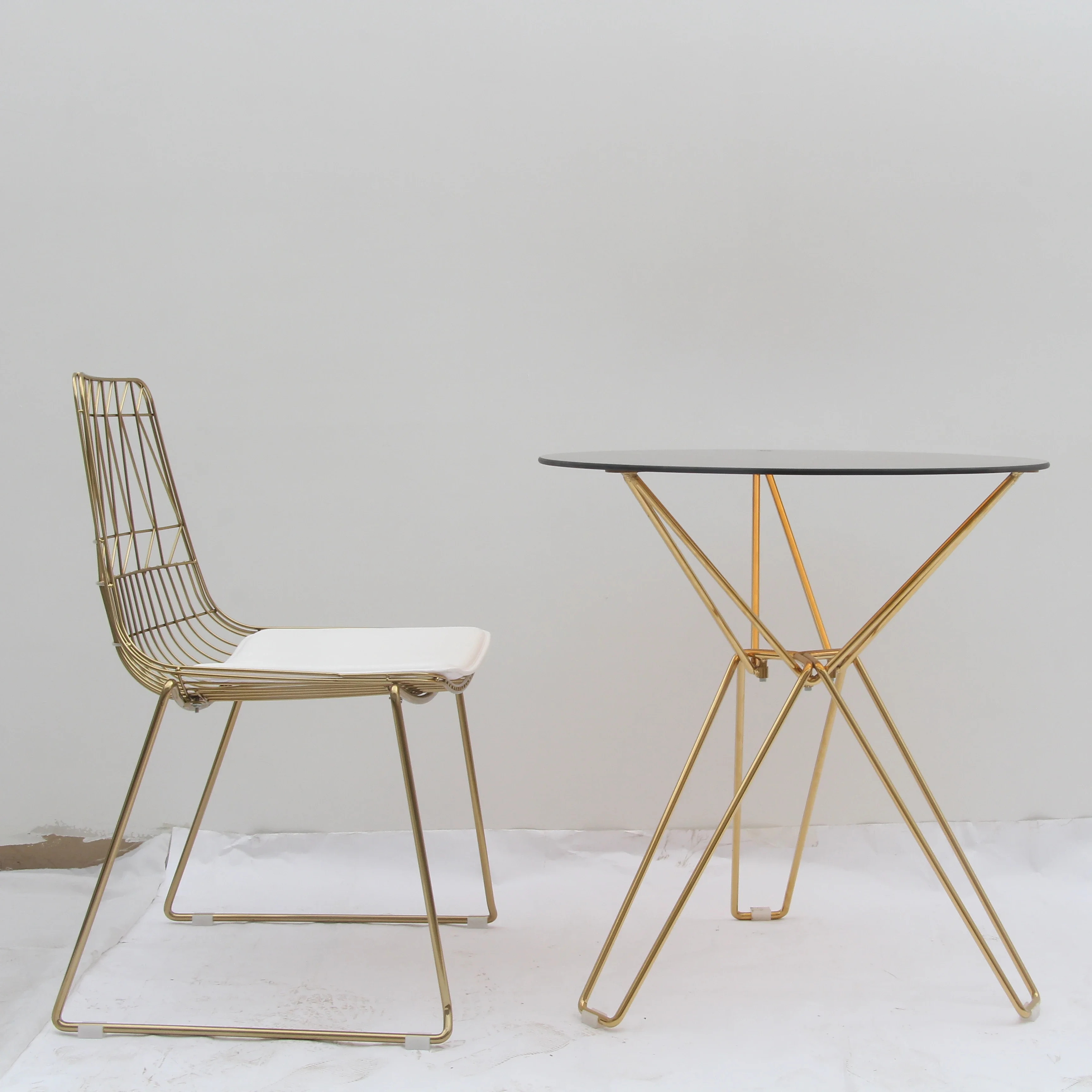 

'modern factory rose gold iron mesh frame white wedding luci outdoor metal wire chair