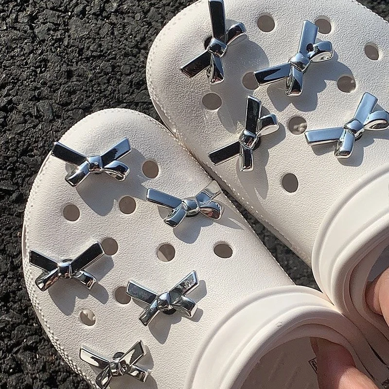 Whole Set Hot Sale DIY Hole Shoes Charms Electroplated Silver Bow Tie Accessories Designer Garden Shoe Decoration Girl Gift