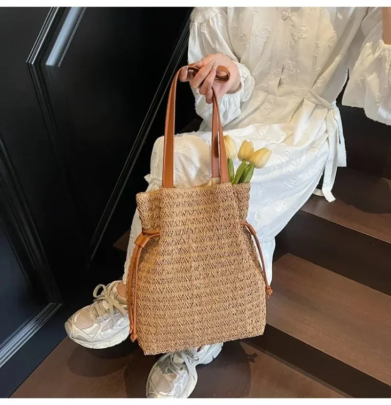 

2025 New Essential Straw Tote Bag - Trendy Boho Style, Drawstring & Large Capacity, Hollow Design, Ideal for Beach and Commute