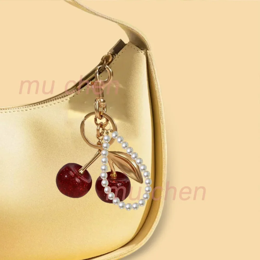 حقيبة الكرز العصرية سلسلة المفاتيح المعدنية قسط الجودة مفتاح السيارة سحر ملحق جذاب قفل مفتاح حامل لحقائب اليد