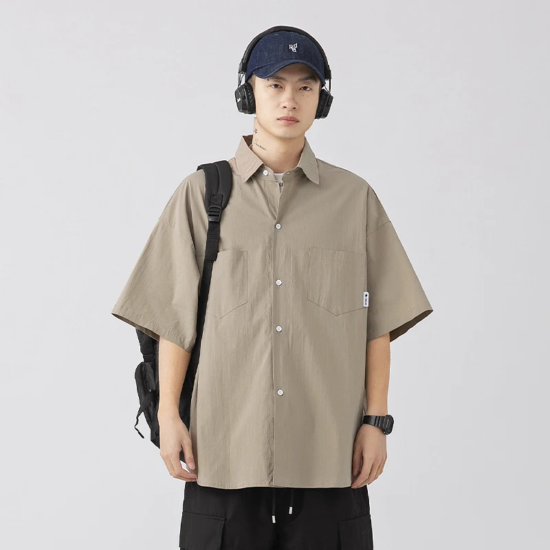 Vintage Solid Color Pocket Details Short Sleeve Shirt for Men Loose Fit Trendy Workwear Shirt Jacket for Spring and Summer