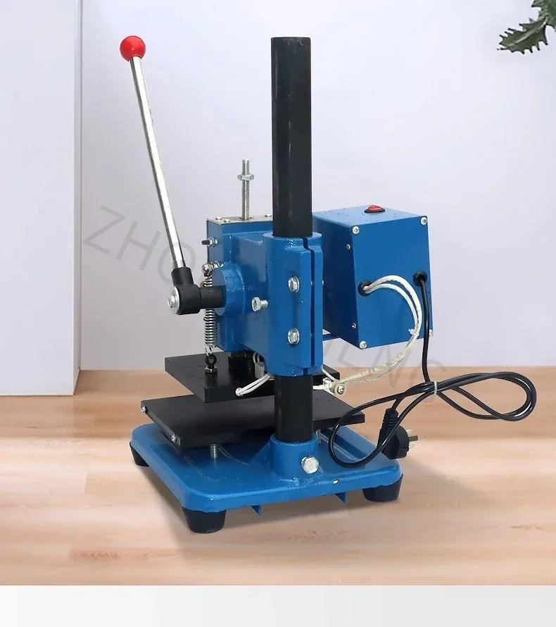 Hot-press embossing machine, manual hot stamping machine, machine for embossing and hot stamping leather labels and trademarks.