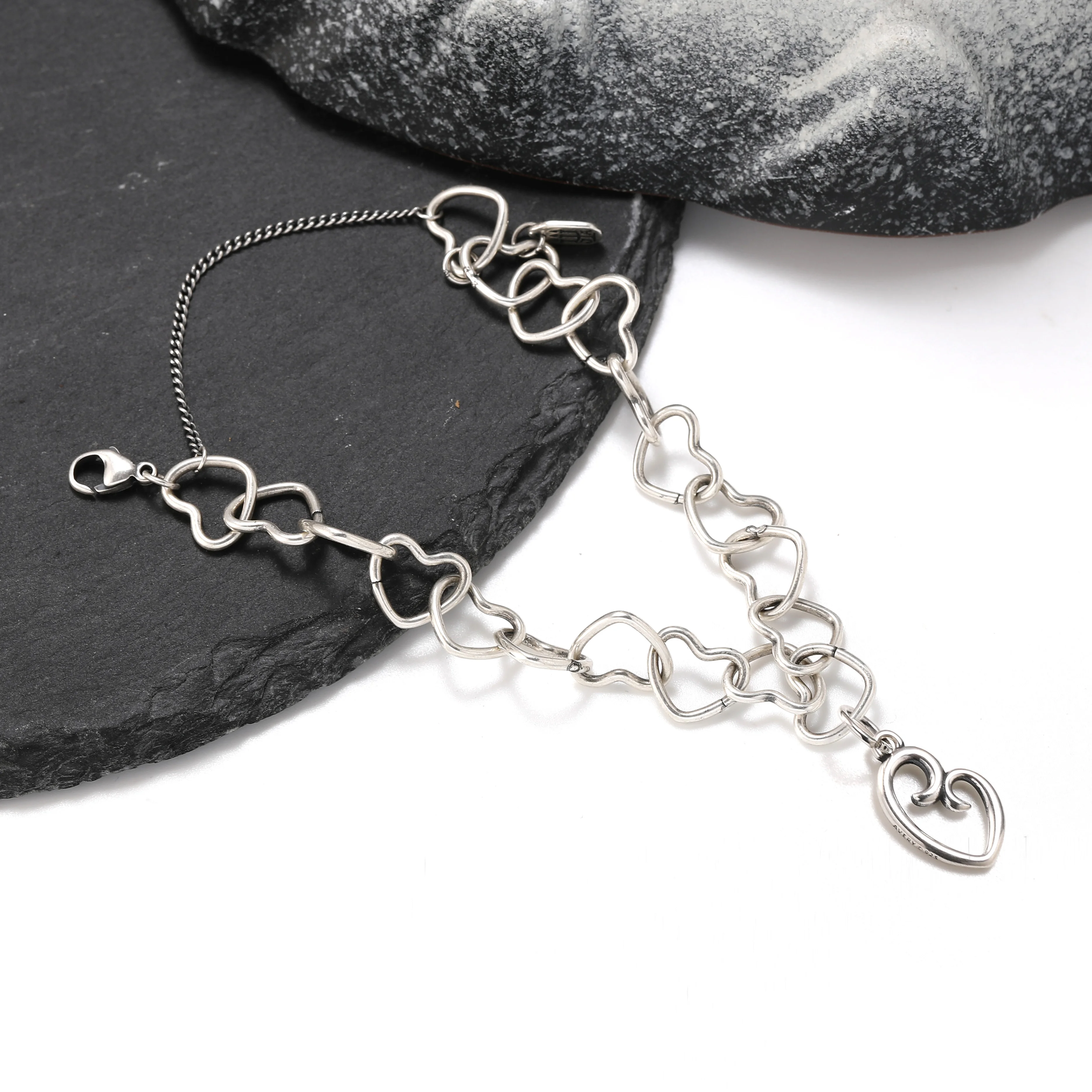 

Genuine 925 sterling silver Connected Hearts Charm Bracelet with heart pendant