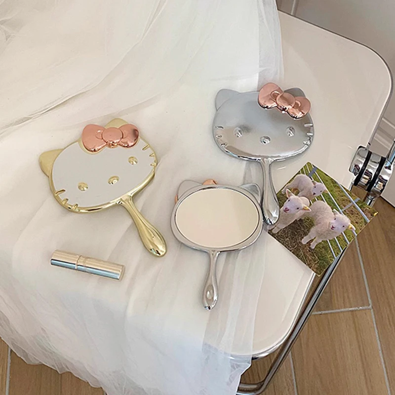 

Sanrios Makeup Mirrors Anime Figures Hellokittys Hand Mirror Kawaii Cute Portable Folding Pocket Mirror Table Décor Girls Gifts