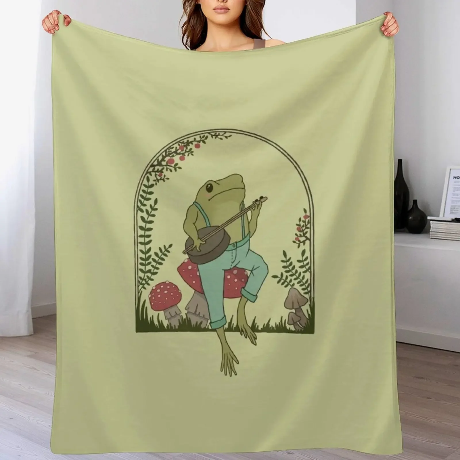 Cottagecore Aesthetic Frog Playing Banjo on Mushroom Cute Vintage - Goblincore Farmer Toad in Garden - Dark Academ Throw Blanket