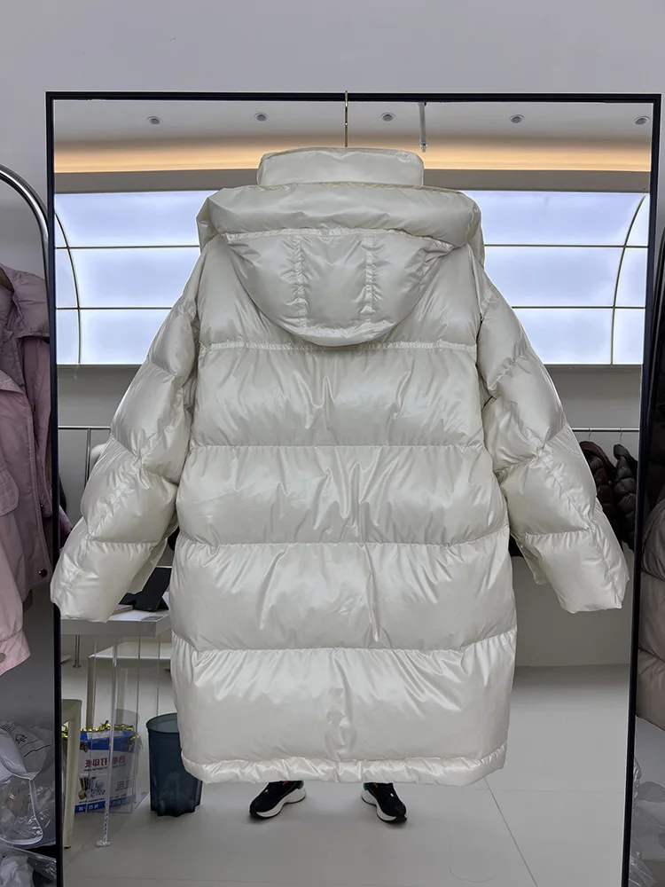 سترة نسائية طويلة بغطاء للرأس فضفاضة بيضاء مبطنة للأسفل سترة عصرية لشتاء 2025 معطف جديد بزرين على شكل قرن البقر بلون سادة #5