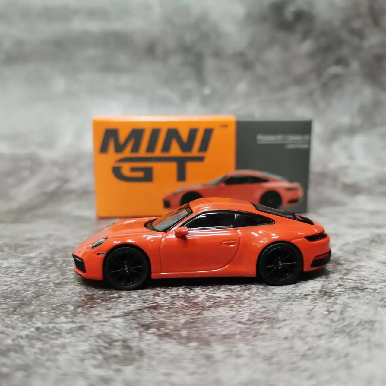 MINI GT 1:64  911 (992) Carrera 4S Alloy Die-Cast Model Car - Lava Orange MGT00371-LHD