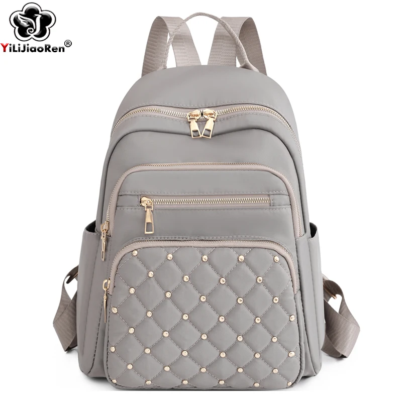 Moda Bagpack Kobiety Wysokiej jakości nylonowe plecaki Kobieta Duży plecak podróżny Duże torby szkolne dla nastoletnich dziewcząt Torba na ramię