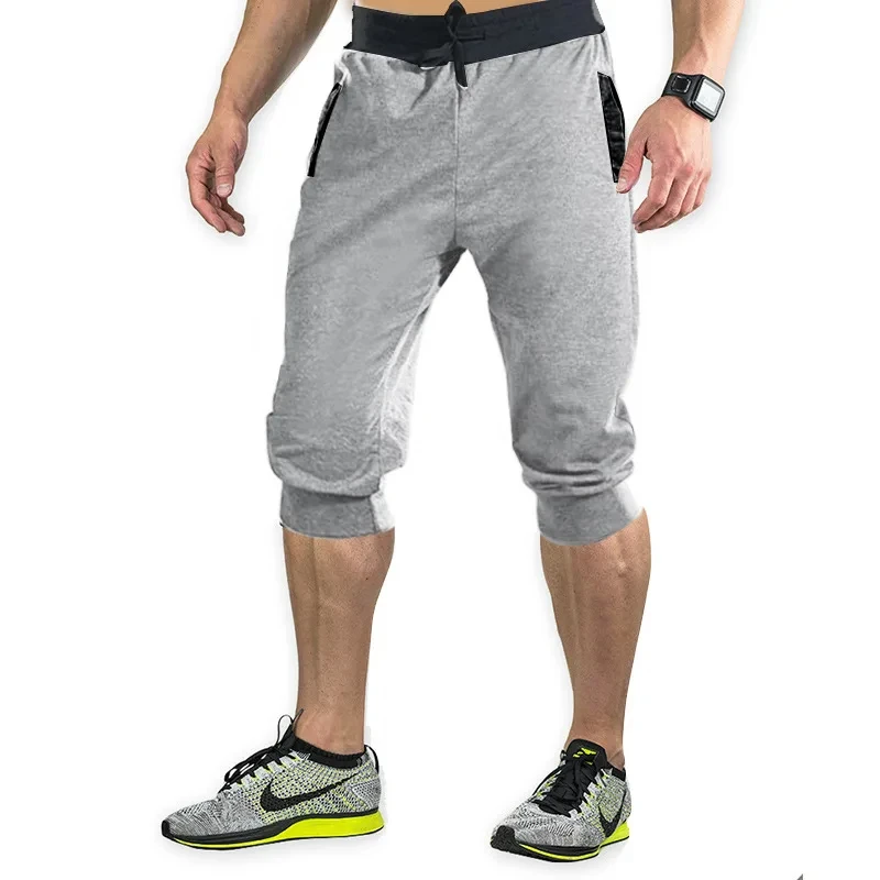 New cross-border sports pants men\'s casual jogging shorts elastic fitness pants cropped pants M-4XL