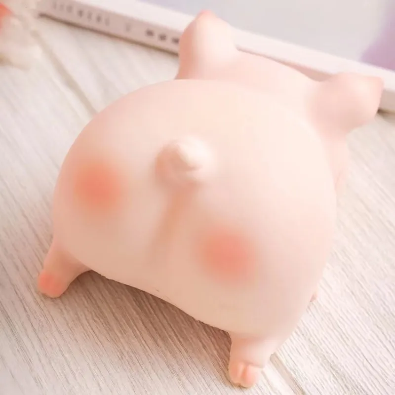 

Canned Lulu pig squeeze and bounce relaxation toy, popular online figure of a piggy with a squatting posture, decorative figurine, doll, gift, cartoon character.
