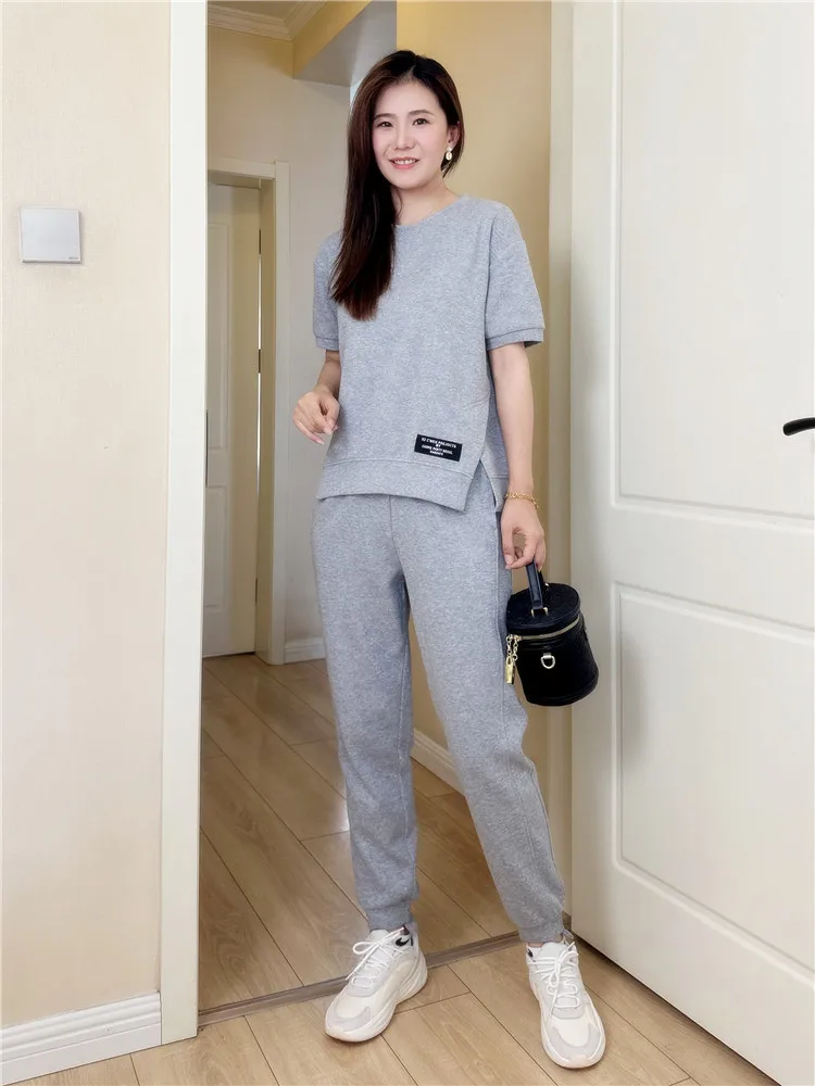 

Хлопковый спортивный костюм для женщин, лето 2025, новинка, премиум-класс, омолаживающий, облегающие брюки, комплект из двух предметов, пуловер с круглым вырезом