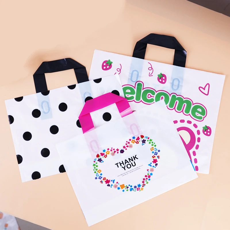 50Pcs/Lot 4 Sizes Plastic Gift Bags High Quality Clothes Store Packaging Bags Cute Printing Thicken Party Favor Bags