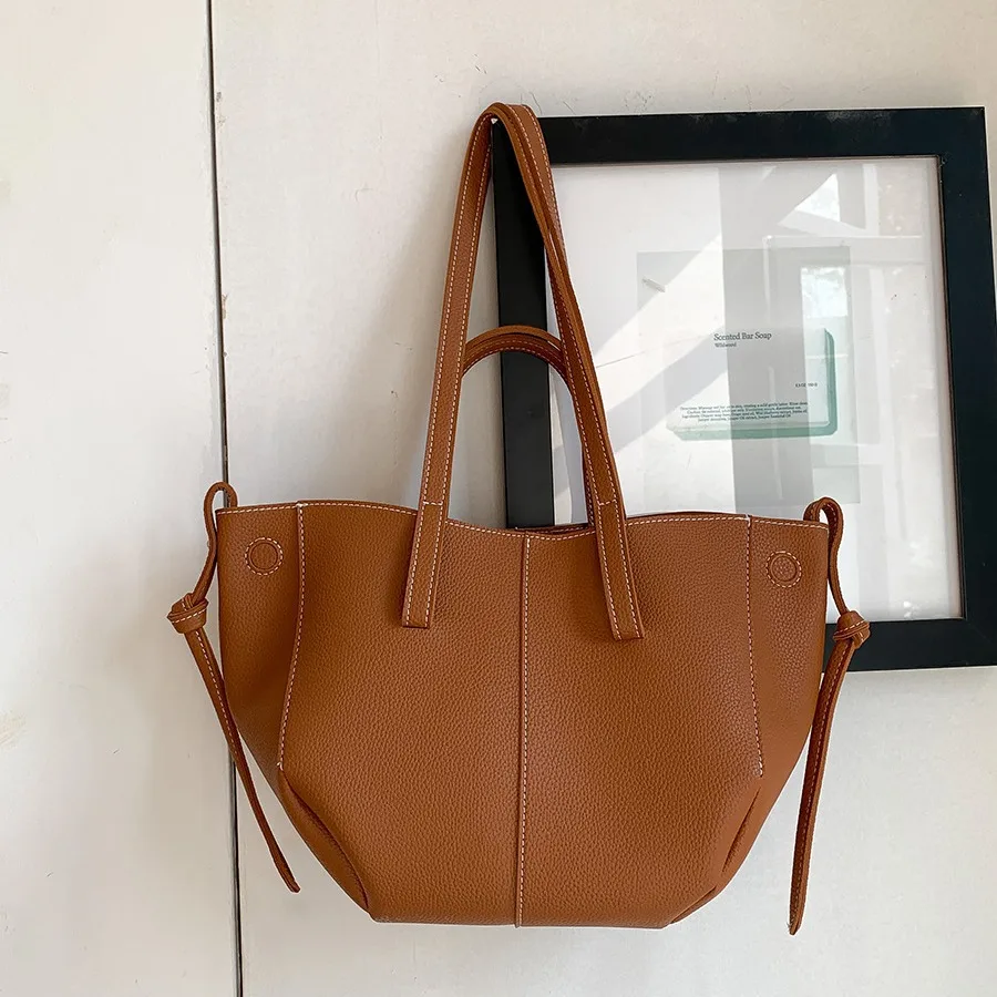 

2024 soft leather PU wing bag, South Korea's new large-capacity handbag, commuter women to work