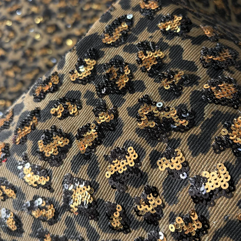 

Leopard chip embroidered denim fabric, dress wrap skirt bag sequin fabric,cotton denim handmade DIY fabric