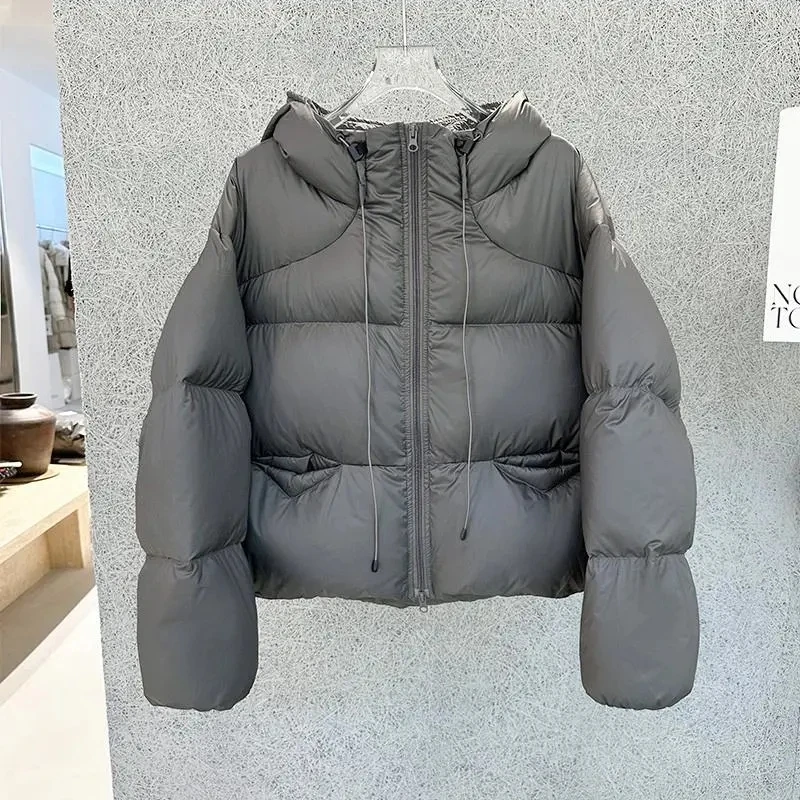 เสื้อโค้ทพาร์กาแฟชั่นแบบเรียบง่ายบุใยฝ้ายแบบมีฮู้ด เสื้อแจ็คเก็ตพัฟเฟอร์ผ้าฝ้ายแบบสั้นสำหรับผู้หญิง เสื้อโค้ทผ้าฝ้ายบุหนาสำหรับผู้หญิง