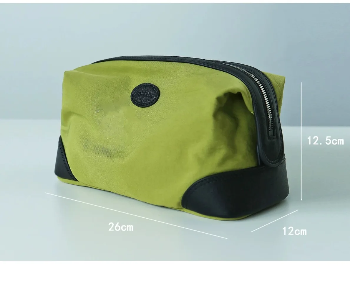 Waterproof nylon toiletry bag with genuine leather, large-capacity cosmetic storage pouch for travel and business trips
