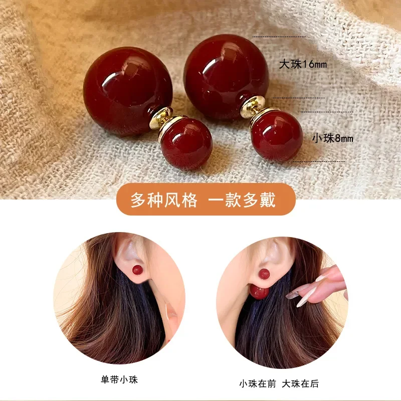 Boucles d'oreilles à clous en perles de taille double face, boucles d'oreilles rouges du Nouvel An, sens populaire haut de gamme, adaptées au nouveau chinois, 2024