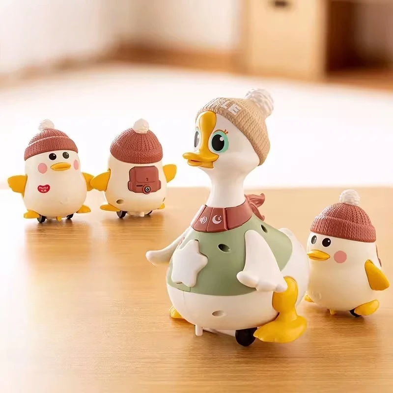 

Battery Operated Dancing Goose Toy ABS Electric Swing Duck with Baby Goose for Early Learning