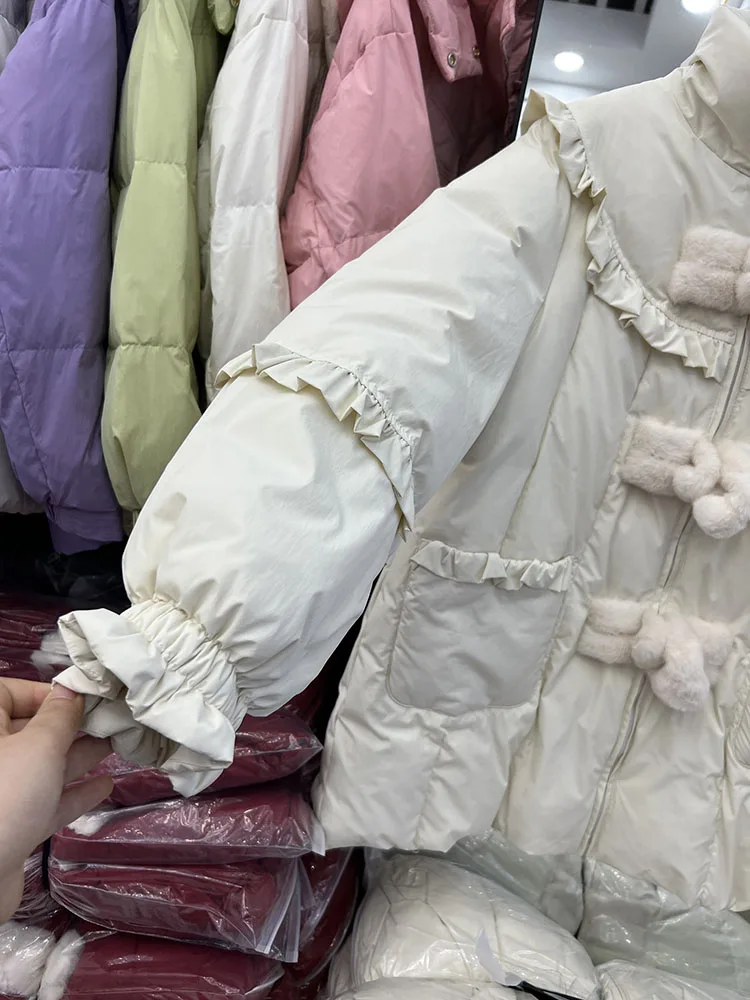 Neue Weihnachts-Daunenjacke im chinesischen Stil für Damen, mittellang bis lang, Stil 2025, Winter, neue Pendel-Daunenjacke mit weißer Ente, trendig