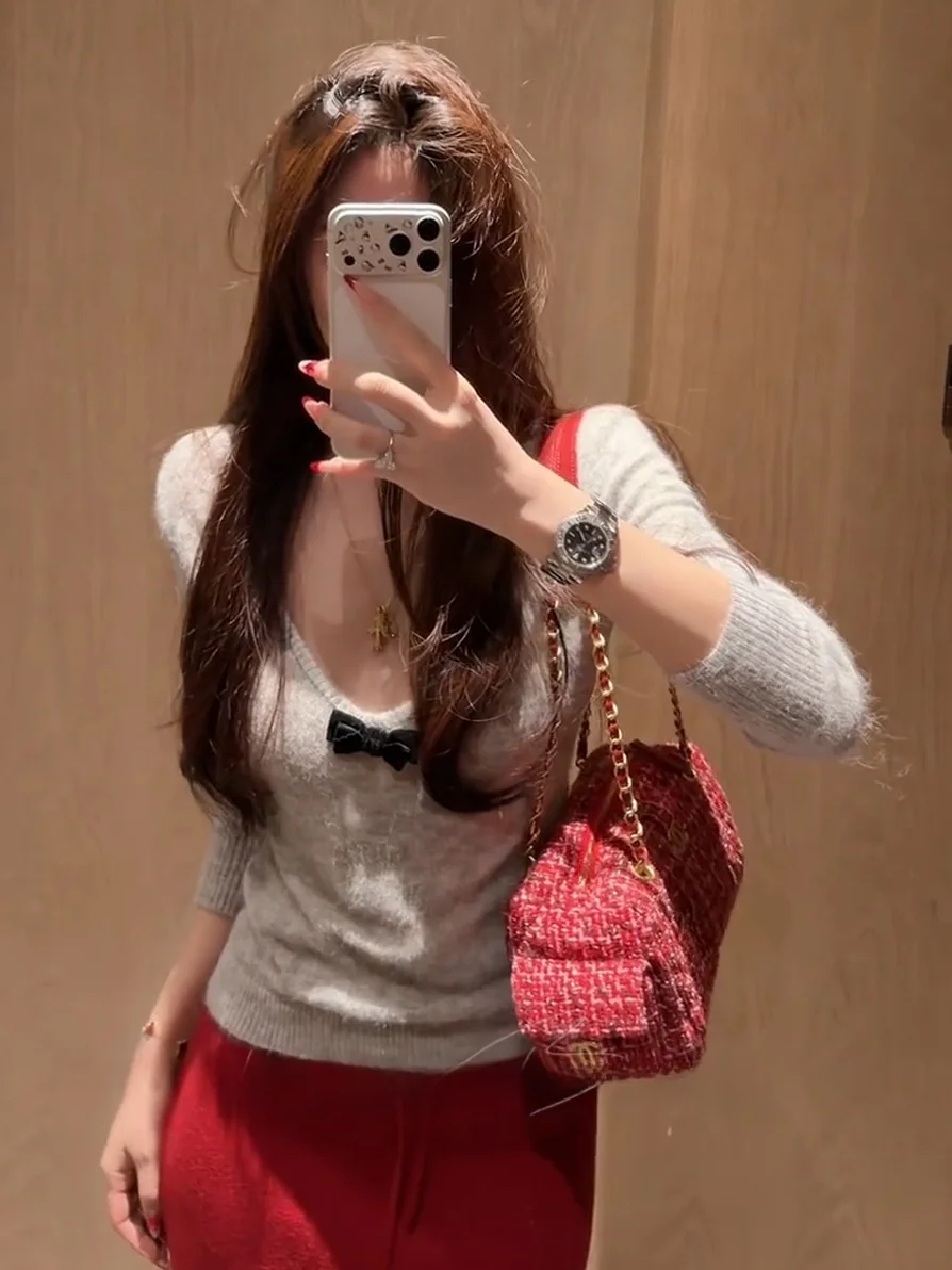 

Женский облегающий мягкий удобный универсальный топ Pure Desire Knot Deep V Long Sve Knitted Base с глубоким V-образным вырезом и длинными рукавами