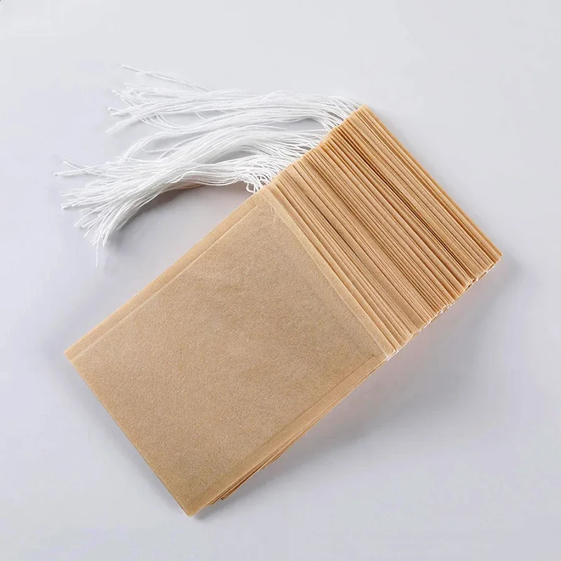 Sachets de thé en papier filtre biodégradable, sachet de thé de qualité alimentaire, écologique, avec cordon de serrage, poudre de feuille libre, passoire de phytothérapie, 100 pièces