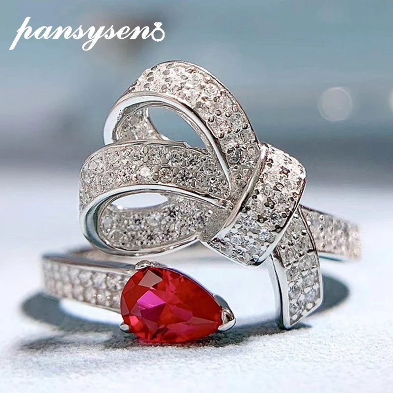 

PANSYSEN Luxury Solid 925 Sterling Silver Pear Cut Ruby High Carbon Diamond Gemstone Wedding Engagement Rings for Women Gifts