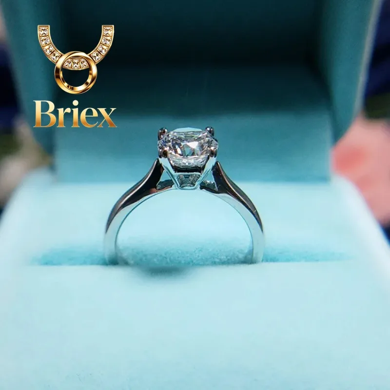 

Briex Jewelry Women's 1 Carat Moissanite Ring, PT950 Platinum, Simple Four-Prong Setting, Brilliant Sparkle & Timeless Design
