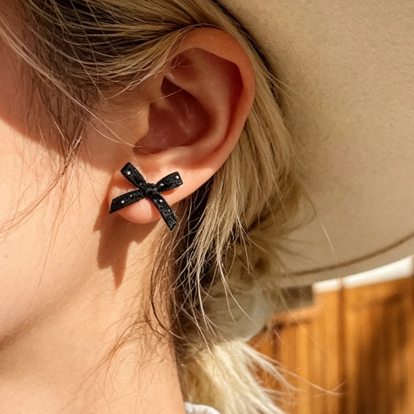 Biological porcelain ribbon polka dot bow stud earrings female ear hole earbone stud sweet earrings niche design earrings