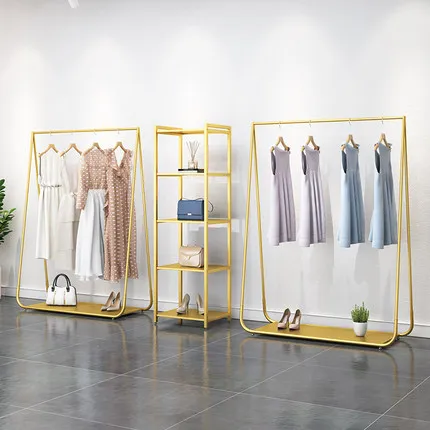 

Clothing store display rack Golden women's clothing store hanger Floor-to-ceiling shelf Simple and light luxury