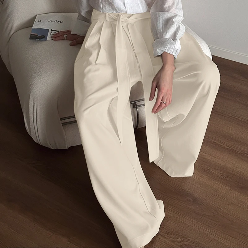 

INCERUN Men Wide Leg Pants Solid Color Button Joggers Lace Up Loose Trousers Men Streetwear Loose Fashion Casual Male Long Pants