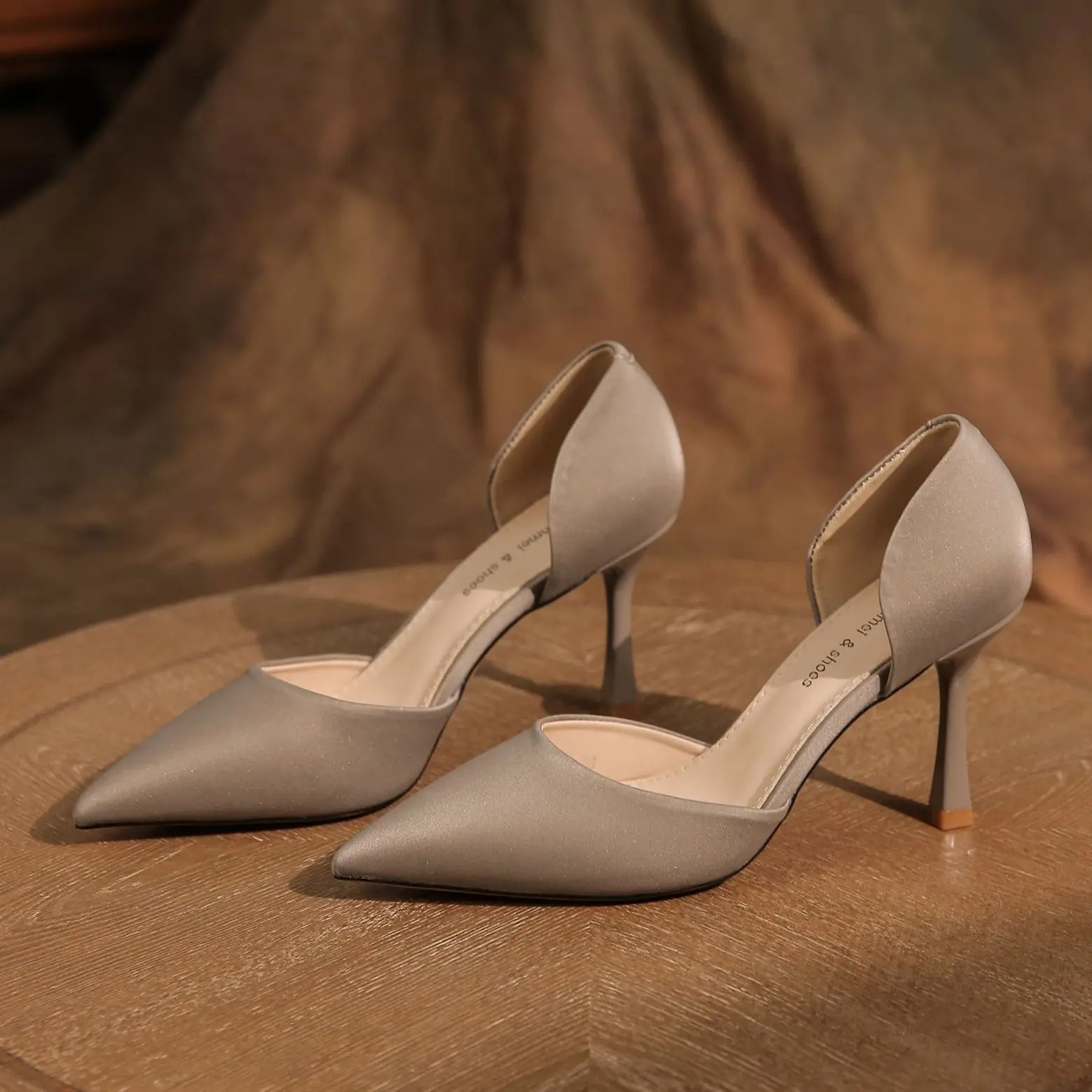

Satin hollow thin heeled women's high heels with simple temperament and elegant French style women's shoes