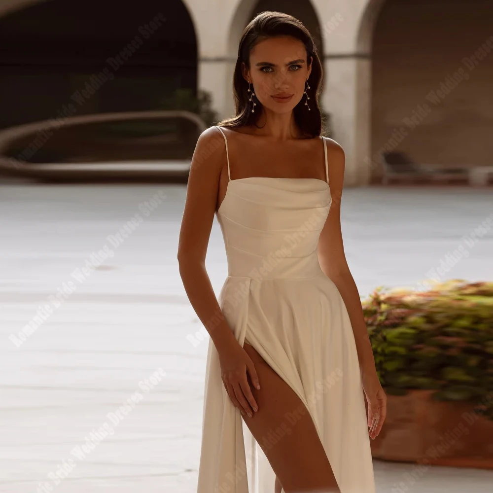 ชุดแต่งงานผู้หญิงแบบสายเดี่ยวเซ็กซี่ ปี 2026 ดีไซน์หรูหรา ผ่าข้างสูง ทรงเมอร์เมด สำหรับเจ้าสาว งานเลี้ยง  ชุดเจ้าสาวแบบสั่งตัดได้