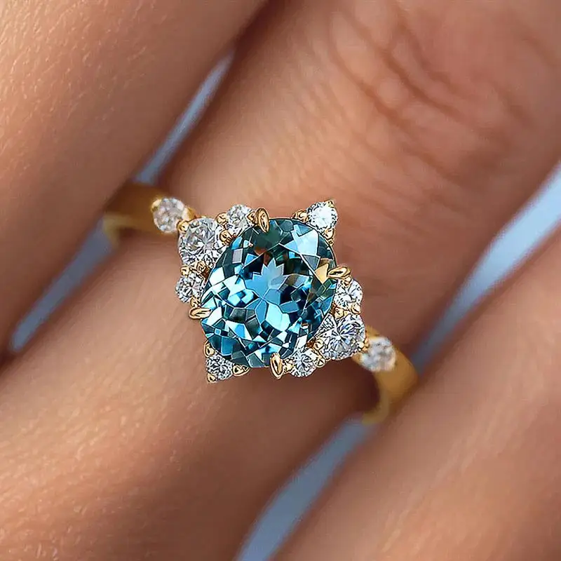 Huitan Eleganter Damenring für Hochzeit, Verlobung, luxuriös, mit hellblauem CZ-Stein, Party-Accessoires, zarter Damenschmuck, Geschenk – Detail 4
