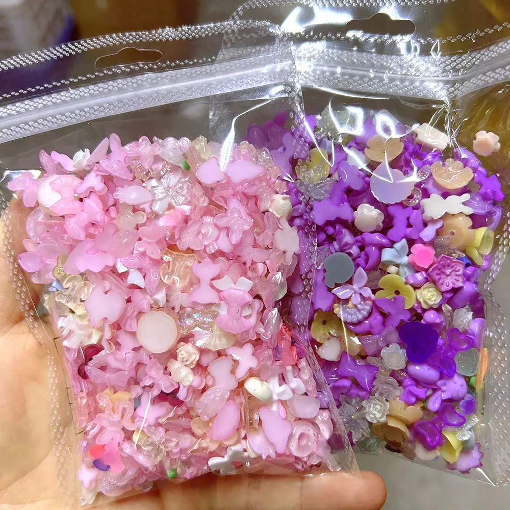 

50g/bag Pink Purple Bows Nail Art Charms 500-600pcs Mixed Butterfly/Flower/Bear/Strawberry Nail Decorations 3D Cute Nail Crafts