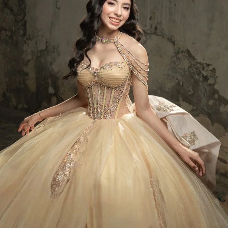 

Customized champagne color Quinceanera Dresses Off the Shoulder Tull crystal applique Long tail Bow Vestido De 15 Quinceanera