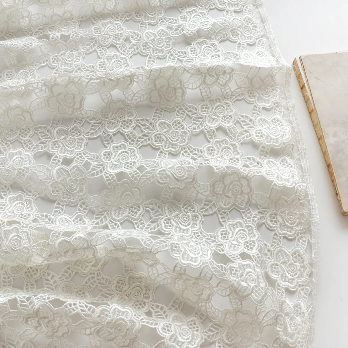 

White stereoscopic shredded milk fabric Hollow out tissu Dress cheongsam fabric wedding dress sewing