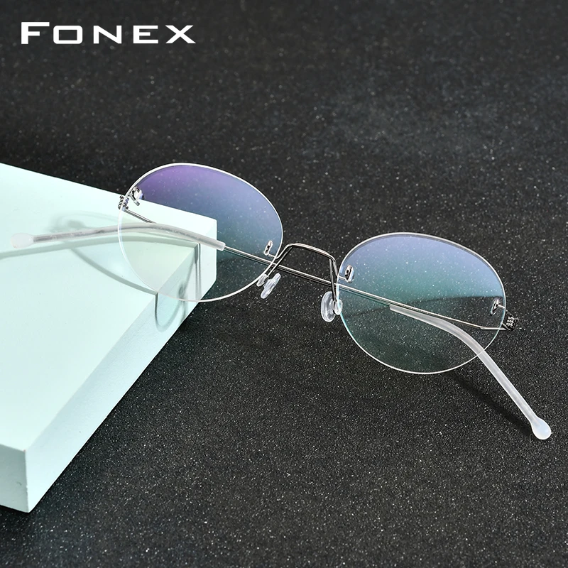 Montura de gafas FONEX de aleación de titanio para hombre, gafas sin tornillos para mujer, nuevas gafas redondas Retro sin montura 2020 98630