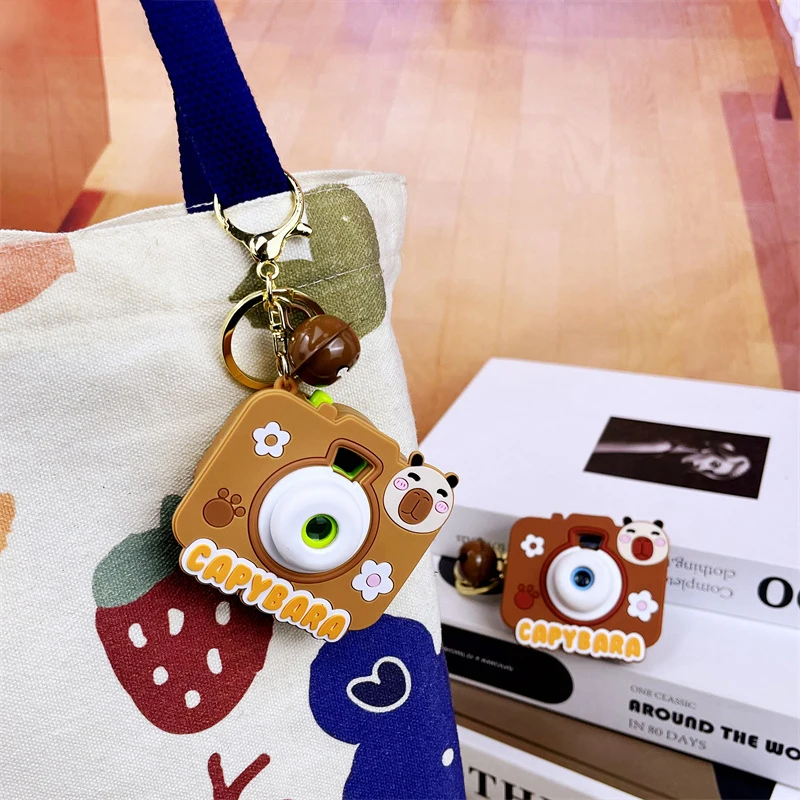 1Pcs Fun Capybara Projection Camera Keychain Cute Cute Little Puffer Fish Camera Toy Bag Charm Men and Women Small Gift Pendant